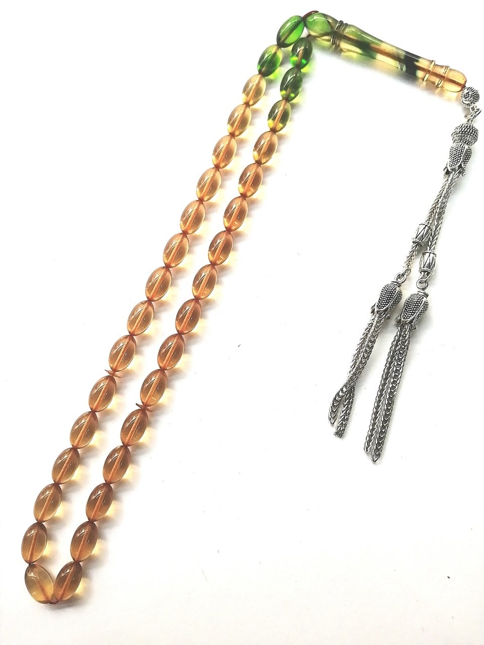 Alpaka Püsküllü Beyzi Kesim Sıkma Kehribar Tesbihimiz Toptan Fiyatına Türkiyenin Online Toptan Tesbih Satış Sitesi toptantesbih.com da Beğeninize Sunulmuştur