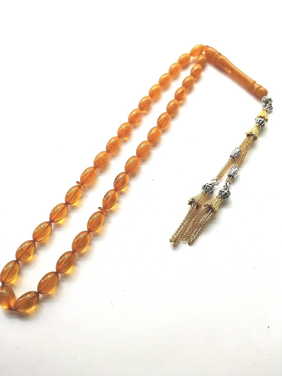 Alpaka Püsküllü Beyzi Kesim Sıkma Kehribar Tesbihimiz Toptan Fiyatına Türkiyenin Online Toptan Tesbih Satış Sitesi toptantesbih.com da Beğeninize Sunulmuştur