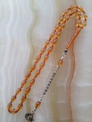 925 Ayar Gümüş Püsküllü Özel İşçilikli Atölye Yapımı Beyzi Kesim Ateş Kehribar Tesbih