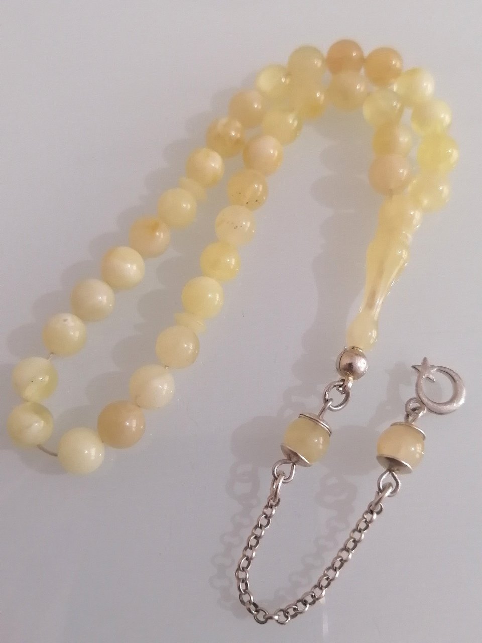 925 Ayar Gümüş Püsküllü Minik Boy Küre Kesim Mat Doğal Damla Kehribar Tesbihimiz Toptan Fiyatına Türkiyenin Online Toptan Tesbih Satış Sitesi toptantesbih.com da Beğeninize Sunulmuştur