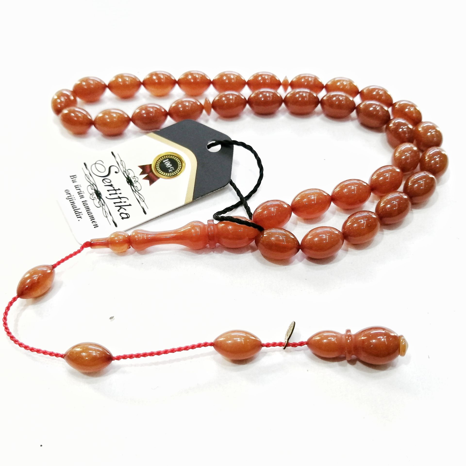 Sistem Püsküllü Alman Förmüllü Beyzi Kesim Sıkma Kehribar Tesbih