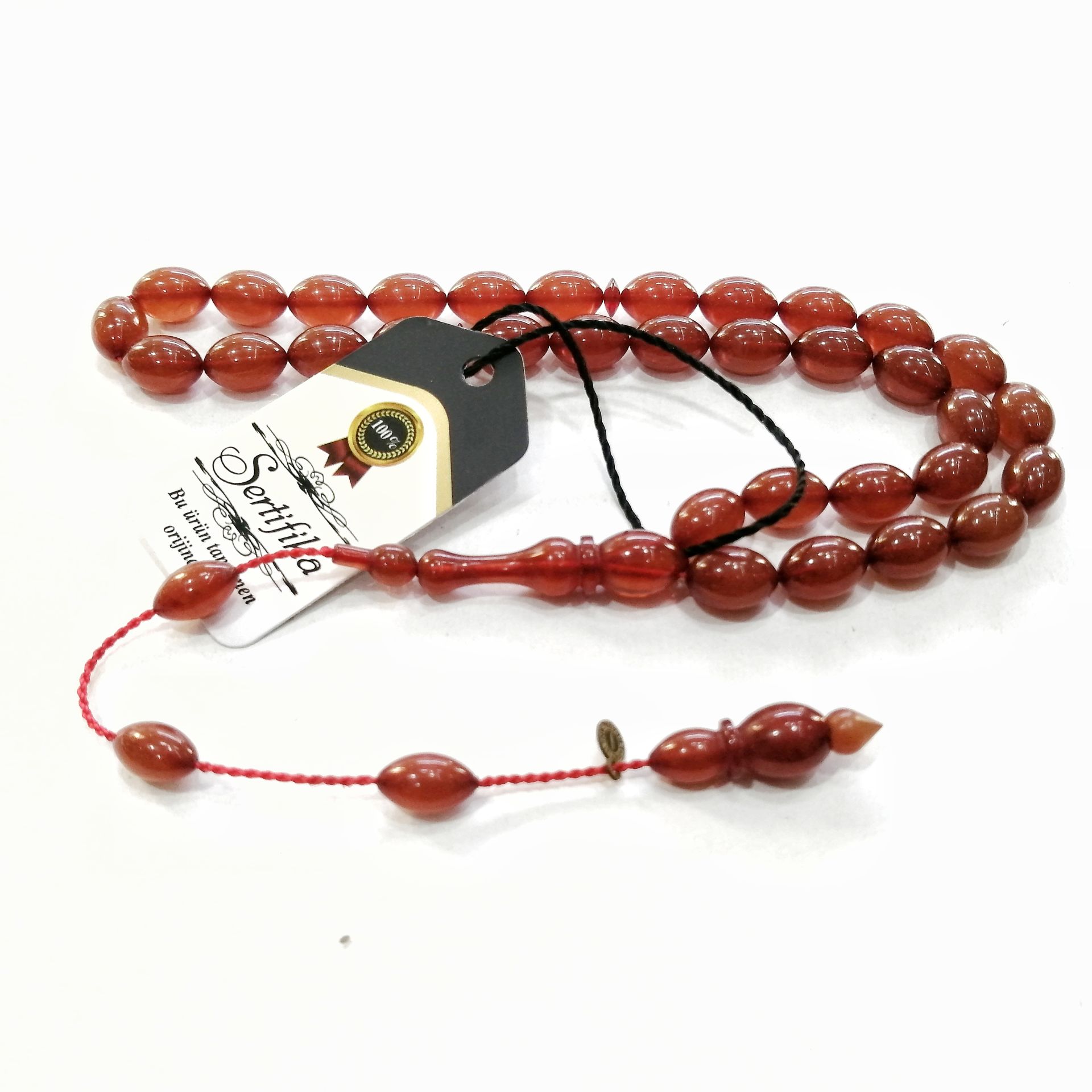 Sistem Püsküllü Alman Förmüllü Beyzi Kesim Sıkma Kehribar Tesbih