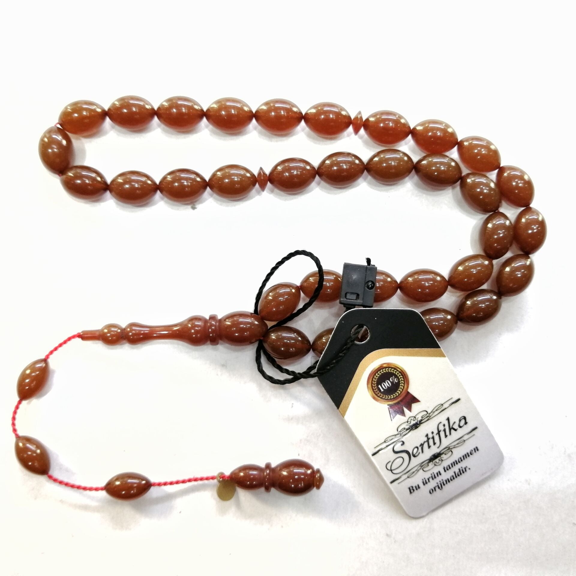 Sistem Püsküllü Alman Förmüllü Beyzi Kesim Sıkma Kehribar Tesbih