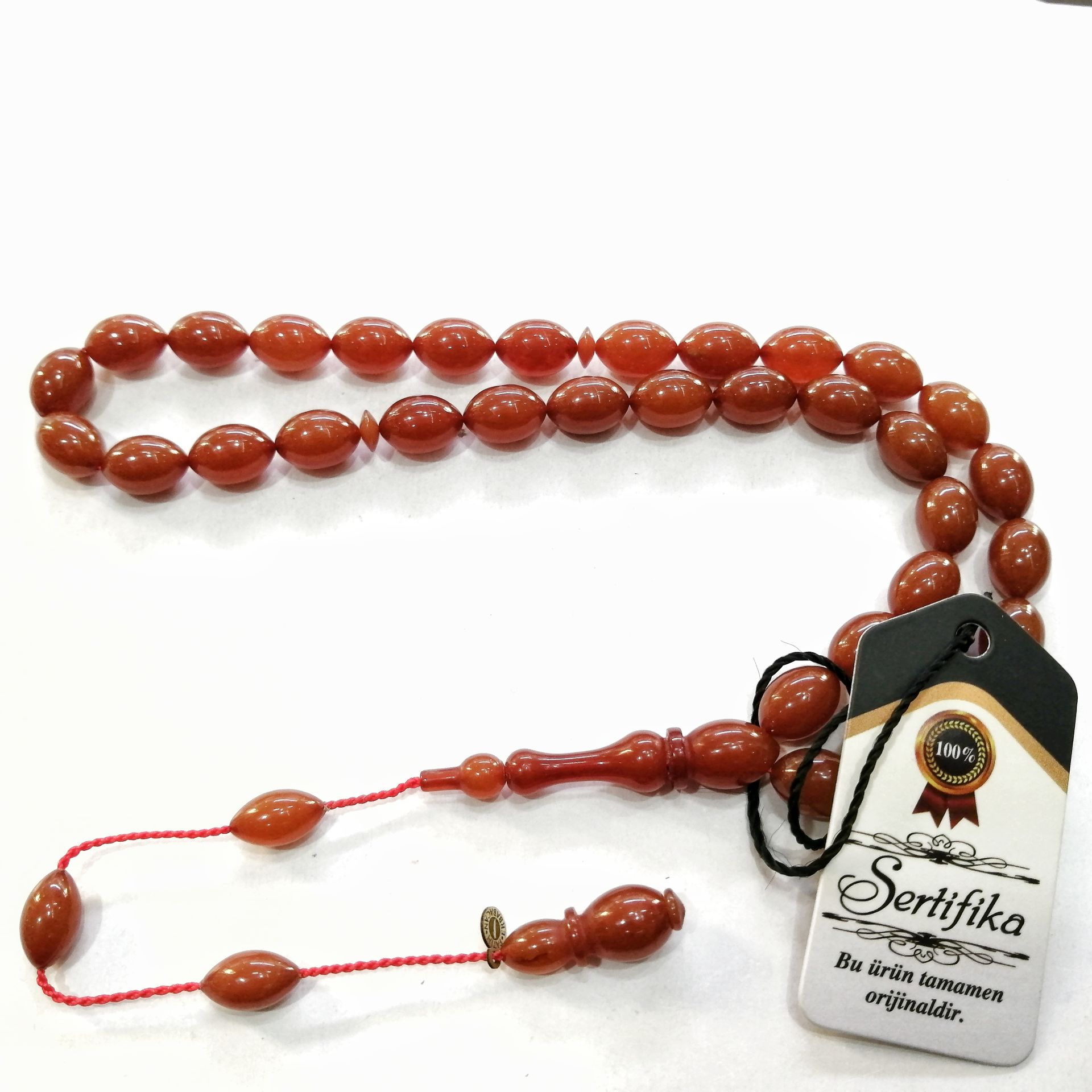 Sistem Püsküllü Alman Förmüllü Beyzi Kesim Sıkma Kehribar Tesbih