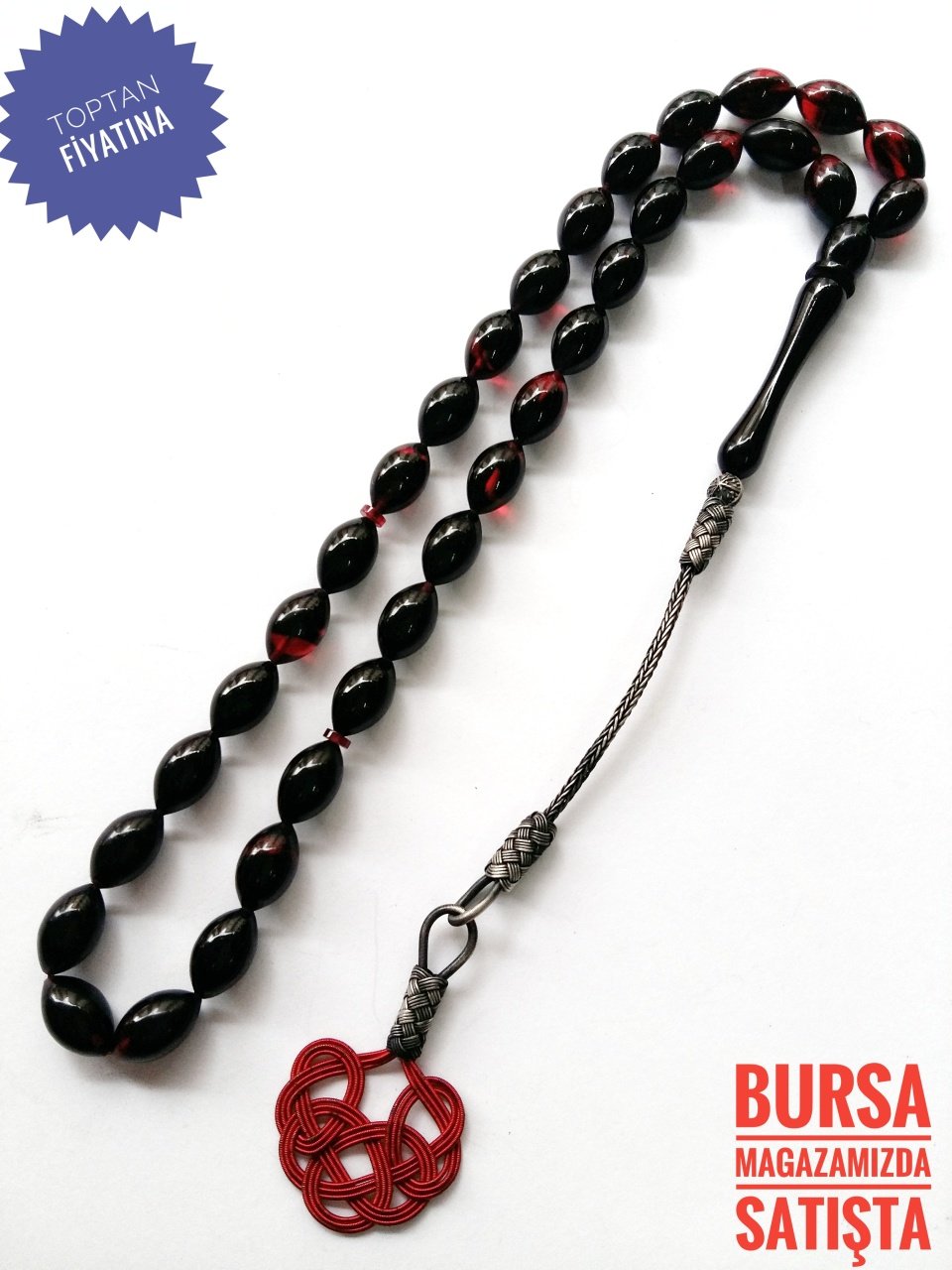Kazaz Püsküllü Kırmızı Hareli 7×11 mm ölçülerinde Sıkma Kehribar Tesbih