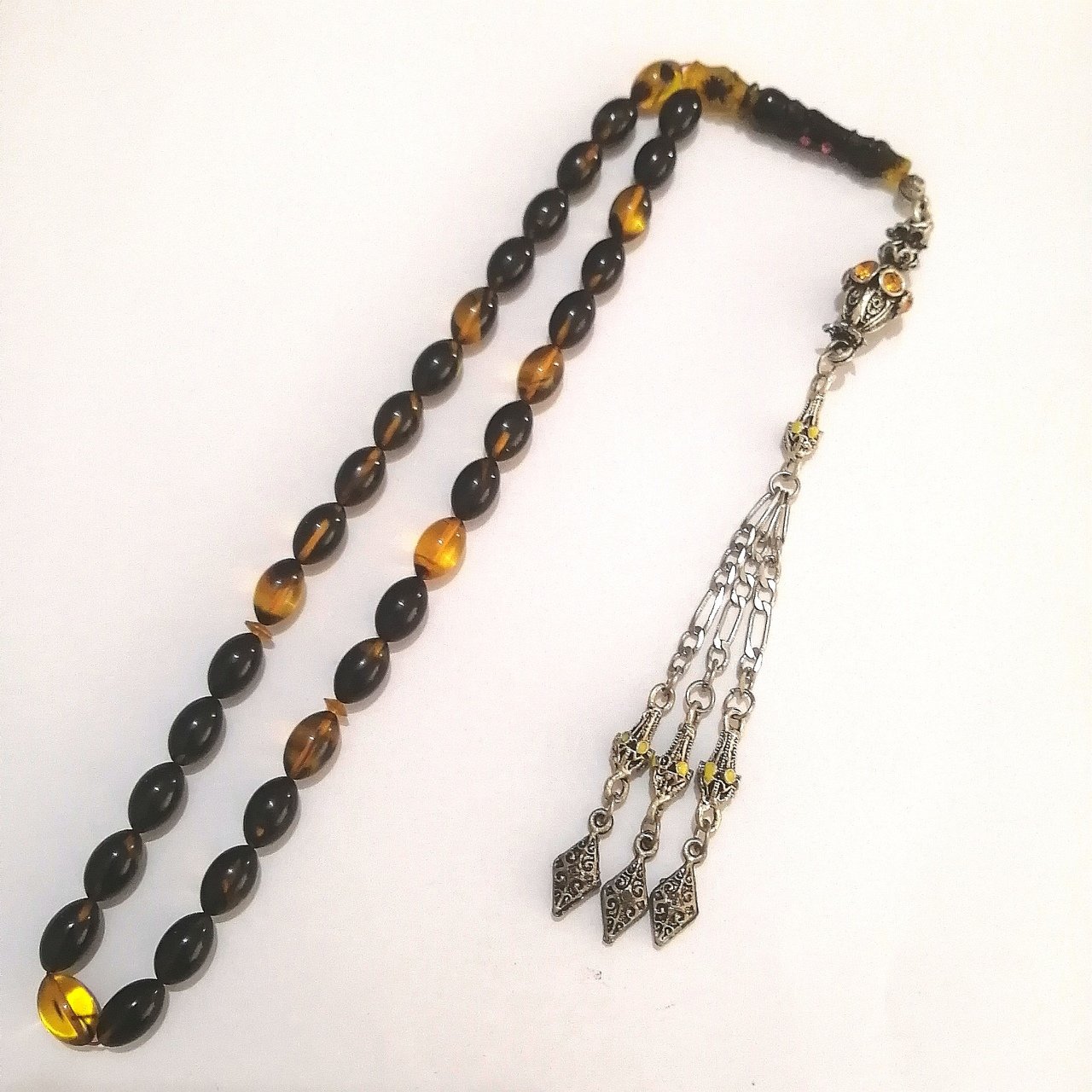 Alpaka Püsküllü İmamesi İşçilikli Beyzi Kesim Hareli Sıkma Kehribar Tesbihimiz Toptan Fiyatına Türkiyenin Online Toptan Tesbih Satış Sitesi toptantesbih.com da Beğeninize Sunulmuştur